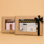 pouch bahan suede warna sage dan pink dalam pink dalam box premium dengan motif tapis khas Lampung, cocok sebagai souvenir pernikahan, hempers, hadiah, dan corporate gift